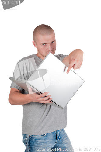 Image of Man in casual clothes with laptop