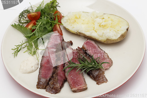 Image of Wagyu steak with salad and potate