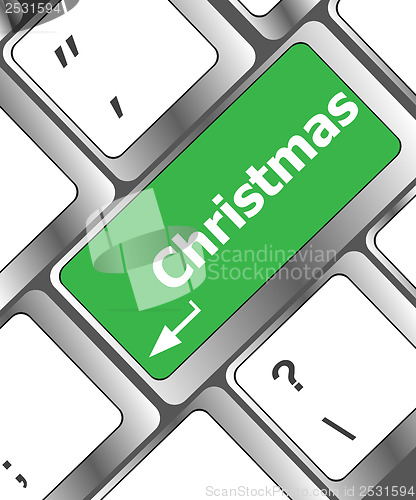 Image of christmas button on the keyboard key - holiday concept