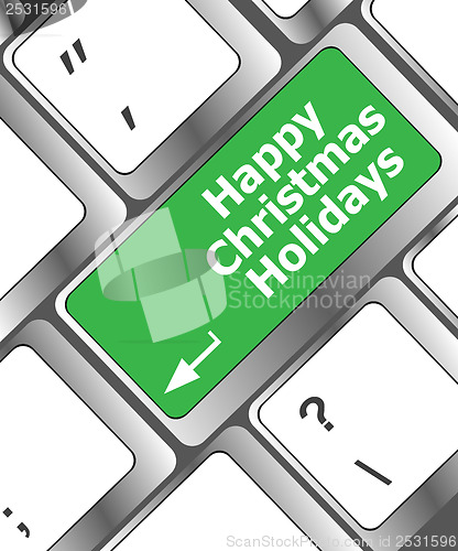 Image of happy christmas holidays button on computer keyboard key