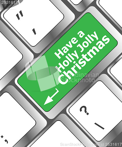 Image of Computer keyboard key with have a holly jolly christmas words
