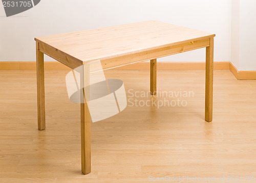 Image of Wooden table in new house