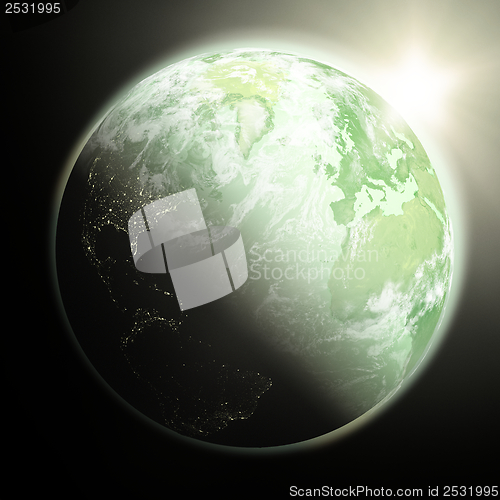 Image of Sun rising over Earth
