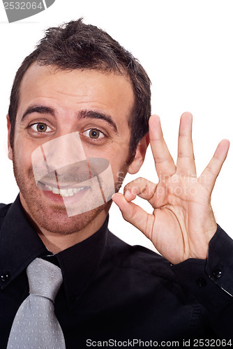 Image of Young businessman makes OK sign