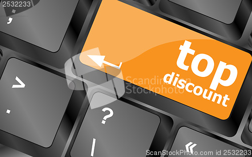 Image of top discount concept sign on computer key