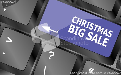 Image of christmas big sale on computer keyboard key button