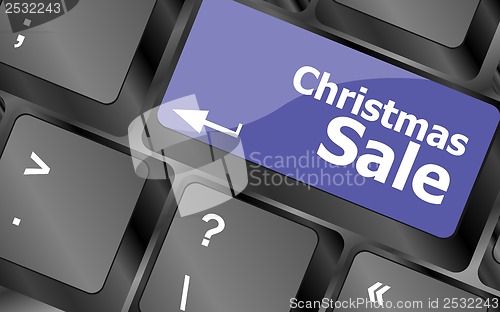 Image of christmas sale on computer keyboard key button