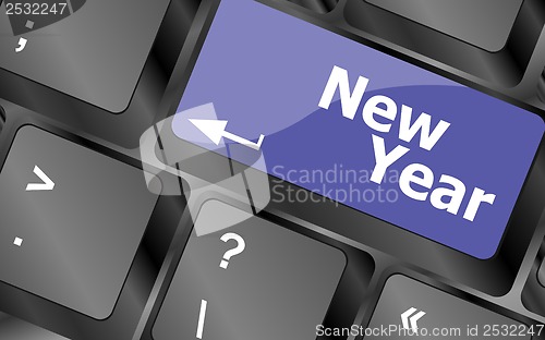 Image of happy new year message, keyboard enter key