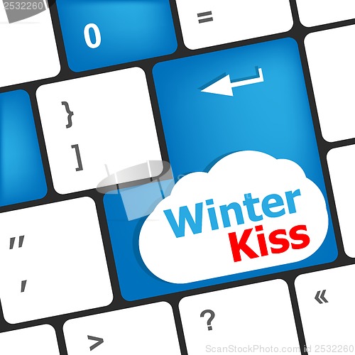 Image of winter kiss on computer keyboard key button