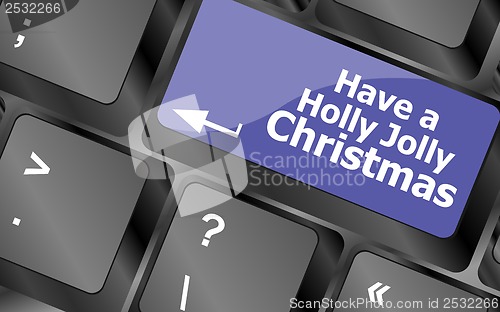 Image of Computer keyboard key with have a holly jolly christmas words
