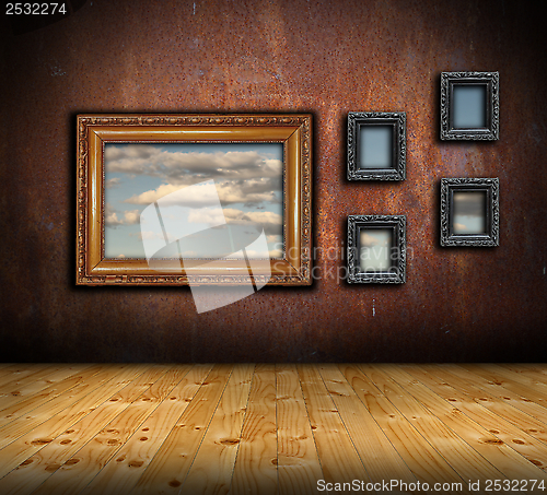 Image of abstract architectural backdrop with frames on wall