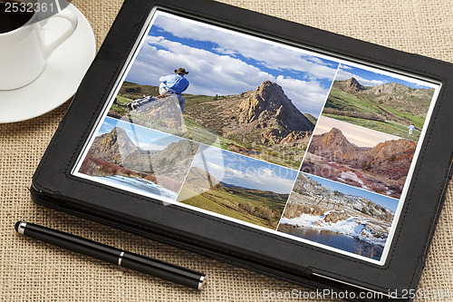 Image of hiking pictures on digital tablet