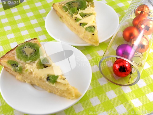 Image of kiwi tasty cake with christmas and new year balls