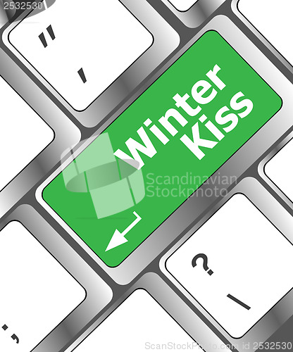 Image of winter kiss on computer keyboard key button