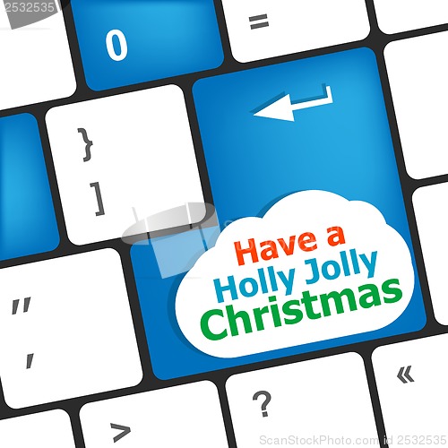 Image of Computer keyboard key with have a holly jolly christmas words