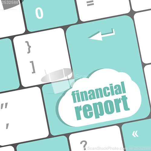 Image of keyboard key with financial report button