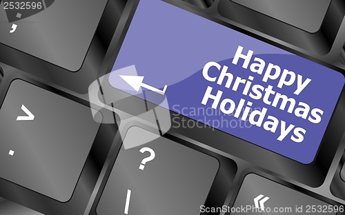 Image of happy christmas holidays button on computer keyboard key