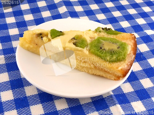 Image of kiwi tasty cake close up at plate