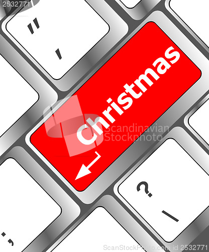Image of christmas button on the keyboard key - holiday concept