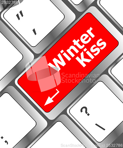 Image of winter kiss on computer keyboard key button