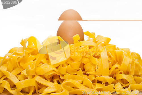 Image of homemade egg pasta on a cutting board