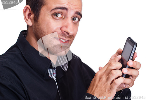 Image of an handsome businessman with a smartphone