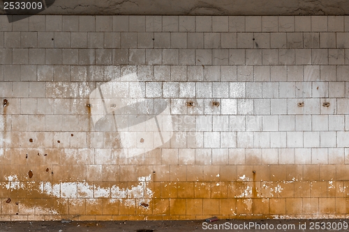 Image of Old tiled wall of an industrial building