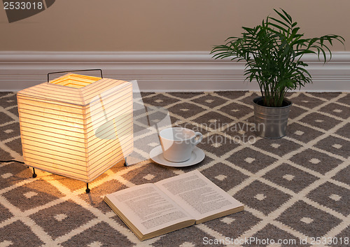 Image of Lamp and a book to read