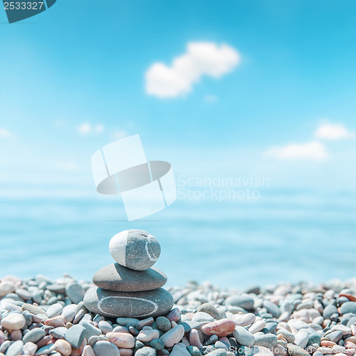 Image of zen-like stones on beach. soft focus