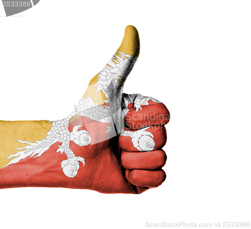 Image of Closeup of male hand showing thumbs up sign