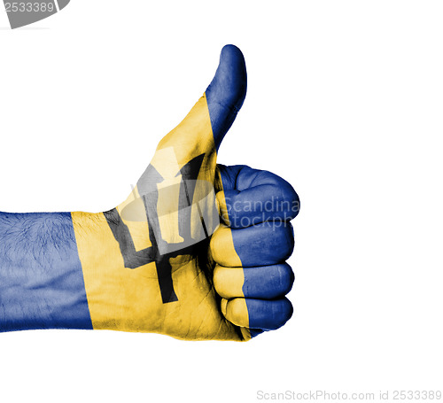 Image of Closeup of male hand showing thumbs up sign