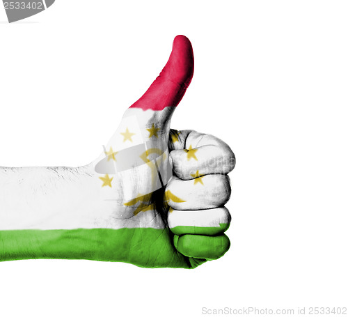 Image of Closeup of male hand showing thumbs up sign