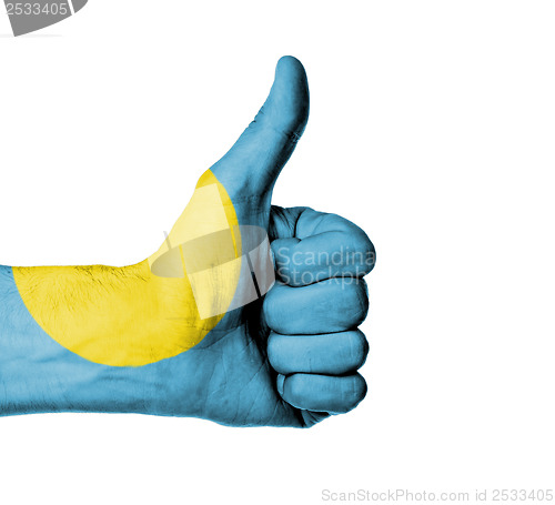 Image of Closeup of male hand showing thumbs up sign