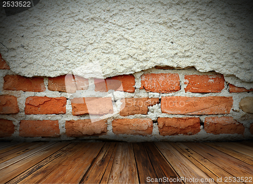 Image of grungy cracked wall on interior background