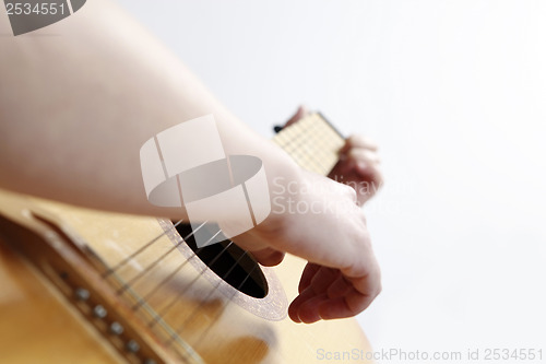 Image of Playing the guitar