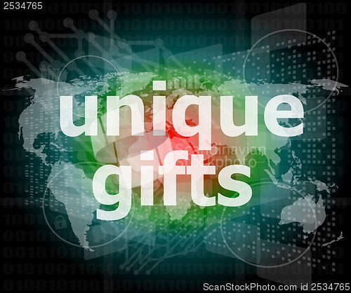 Image of unique gifts text on digital touch screen - holiday concept