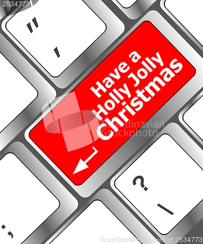 Image of Computer keyboard key with have a holly jolly christmas words