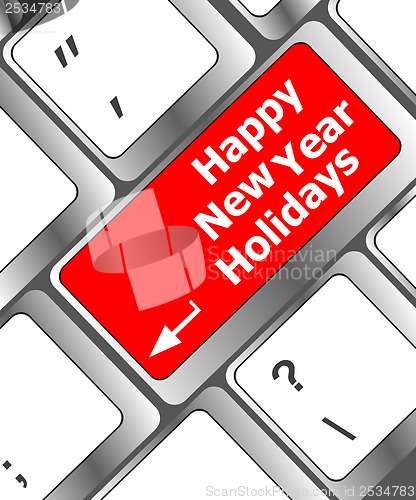 Image of happy new year holidays button on computer keyboard key