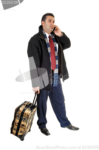 Image of Businessman on cell phone.