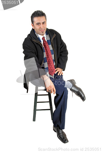 Image of Man sitting.