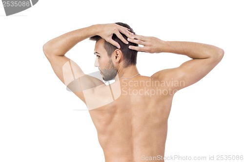 Image of young attractive man in jeans and naked body isolated