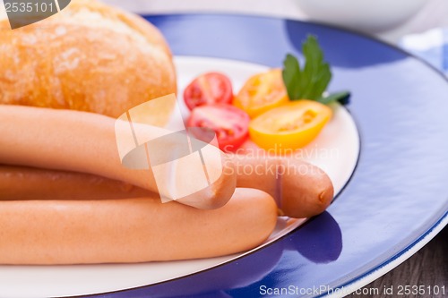 Image of tasty sausages frankfurter with grain bread 