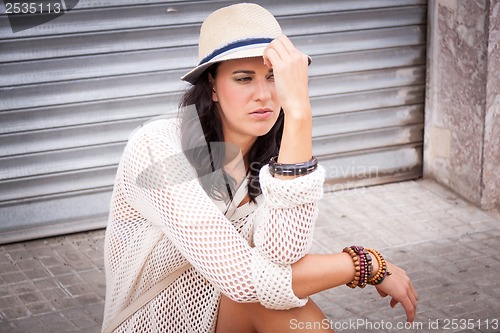 Image of young attractive woman in summer trendy fashion 