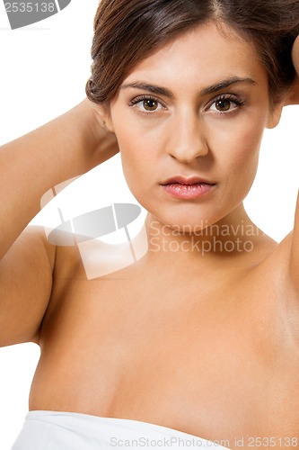 Image of beautiful young woman with perfect skin and soft makeup 