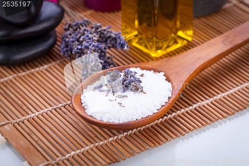 Image of lavender massage oil and bath salt aroma therapy wellness