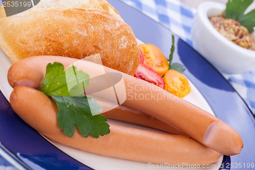 Image of tasty sausages frankfurter with grain bread 