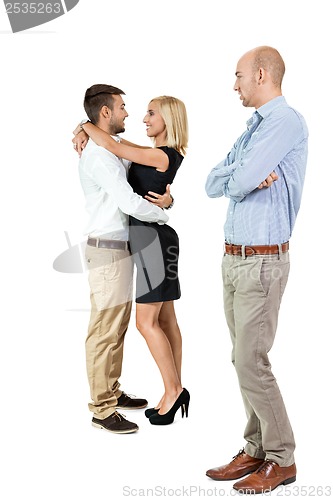 Image of young man unhappy jealous couple behind 