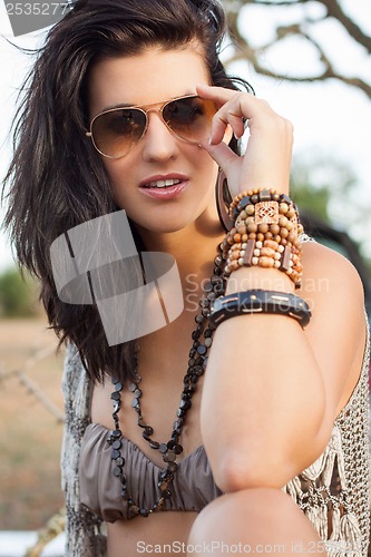 Image of Beautiful stylish woman wearing sunglasses
