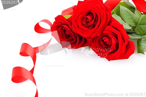 Image of Bouquet of red roses with ribbon border