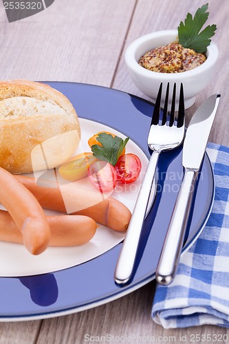 Image of tasty sausages frankfurter with grain bread 